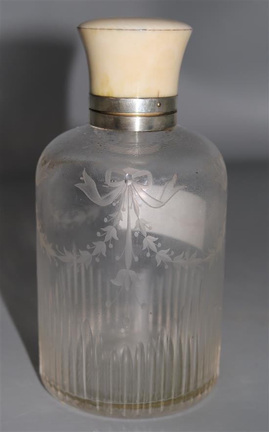 A 1920s silver and ivory mounted cut glass scent bottle, VM, London, 1927, 6.25in.